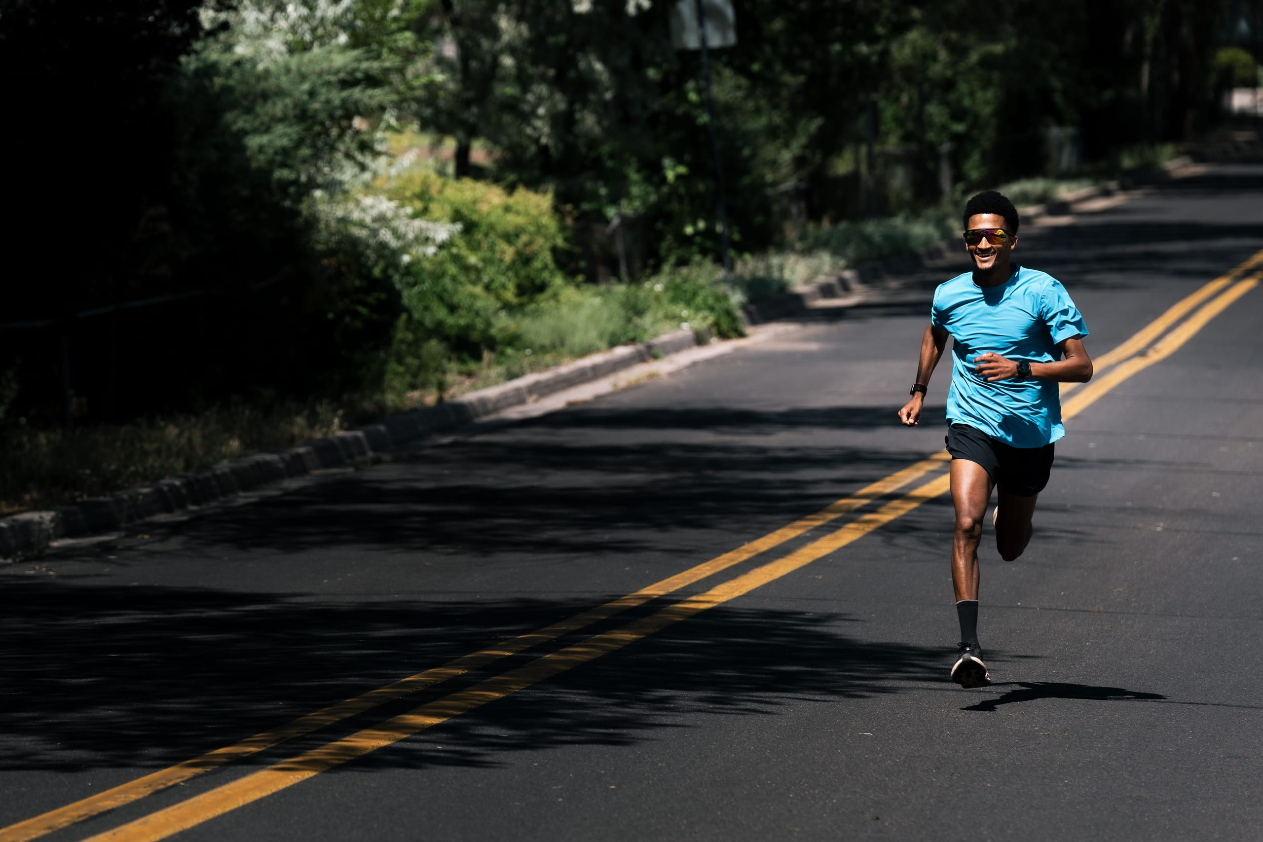 Adrian Wildschutt running on an open road